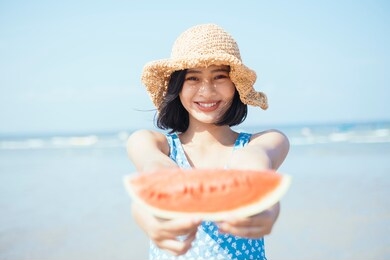 cute asian woman and watermelon.