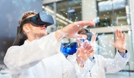 two doctors using virtual reality glasses at visualization training for online investigation