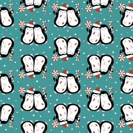 seamless vector pattern with cute christmas penguins on green background. perfect for textile, wallpaper or print design. you can find the matching logo in my christmas set.