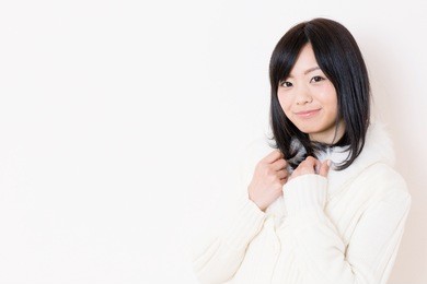 young beautiful asian woman on white background