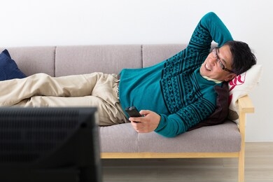 portrait of middle man in front of white wall