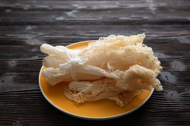 dried tropical stinkhorn mushroom, phallus indusiatus , bamboo mushroom in plate