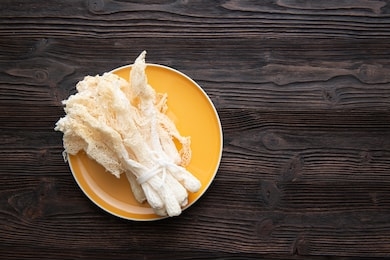 dried tropical stinkhorn mushroom, phallus indusiatus , bamboo mushroom in plate