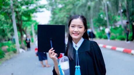 portrait of beautiful asia girl in her graduation day
