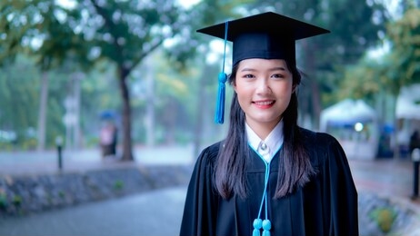 portrait of beautiful asia girl in her graduation day