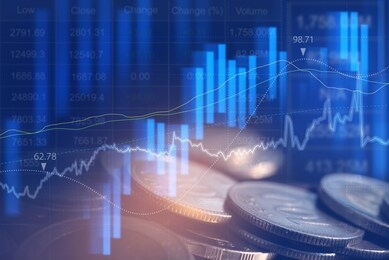 abstract financial graph, stock market report, economic growth, finance and investment concept. double exposure of coin stacks and glowing blue technology financial graph backgrounds