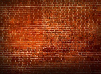 weathered texture of stained old dark brown and red brick wall background, grungy rusty blocks of stone-work technology, colorful horizontal architecture