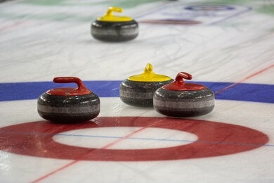 curling game and stones on ice