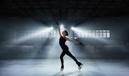 figure skating girl in ice arena.