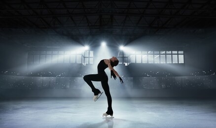 figure skating girl in ice arena.