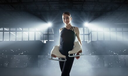 figure skating girl in ice arena.