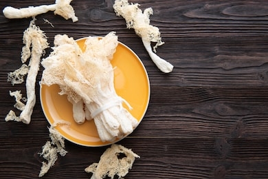 dried tropical stinkhorn mushroom, phallus indusiatus , bamboo mushroom in plate