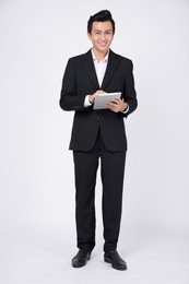 business young asian man isolated background