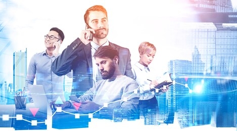 successful young diverse business people working together with gadgets over cityscape background. double exposure of digital graph. concept of teamwork and communication. toned image