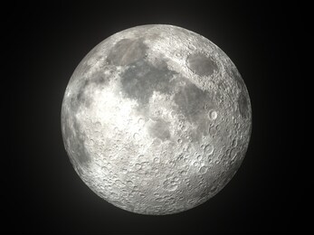 earth's moon glowing on black background