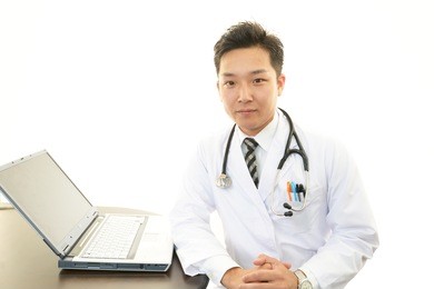 smiling asian medical doctor