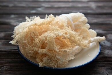 dried tropical stinkhorn mushroom, phallus indusiatus , bamboo mushroom in plate