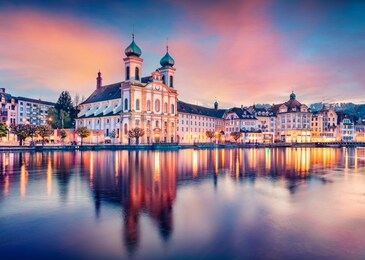 incredible evening view of jesuitenkirche church. spectacular autumn cityscape of lucerne. stunning outdoor view of switzerland, europe. traveling concept background.