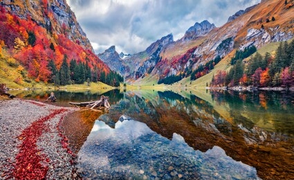 gloomy morning view of seealpsee lake. astonishing autumn scene of swiss alps. majestic santis peak reflected in the calm surface of pure water lake. beauty of nature concept background, switzerland.