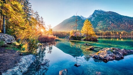 sunny autumn view of hintersee lake with hochkalter peak on background, germany, europe. spectacular morning view of bavarian alps. beauty of nature concept background.