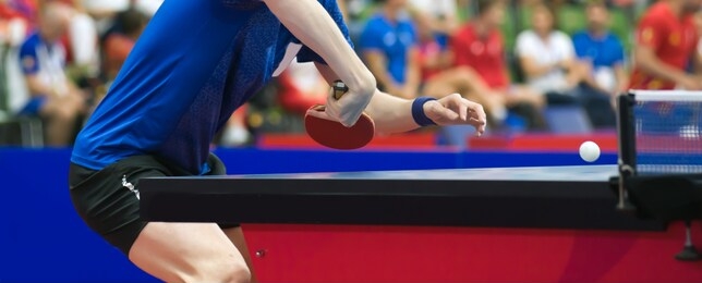 the athlete is preparing to hit the ball with a racket