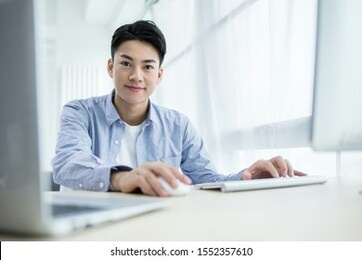 handsome businessman in office working