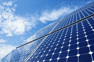 solar panels against the deep blue sky