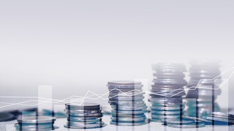 financial investment concept, double exposure of city night and stack of coins for finance investor, forex trading candlestick chart economic , ecn digital economy, business, money, passive income.