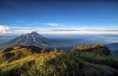 mount merapi at java island, indonesia. copy space area