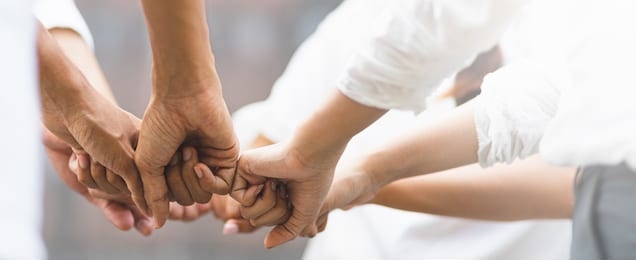 panoramic teamwork business join hand together concept, business team standing hands together, volunteer charity work. people joining for cooperation success business.