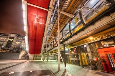 paris. centre george pompidou at night, modern city architecture.