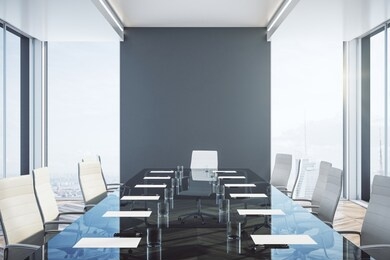 contemporary meeting room with concrete wall and daylight. 3d rendering