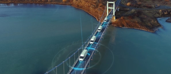 autonomous electric van semi truck car driving on a highway with technology assistant tracking information, showing details. 