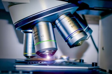 closeup of scientific microscope data analysis in the laboratory