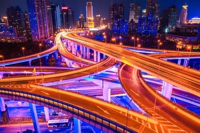beautiful interchange overpass with light show in shanghai at night