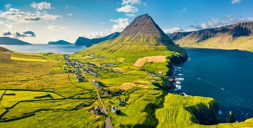 view from flying drone. perfect summer scene of vidareidi village, vidoy island. wonderful morning view of faroe islands, kingdom of denmark, europe. 