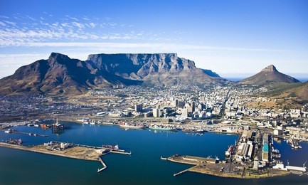 aerial view of cape town city centre, with table mountain, cape town harbour, lion's head and devil's peak