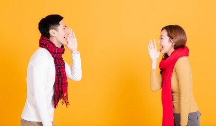 side view asian young couple  shouting