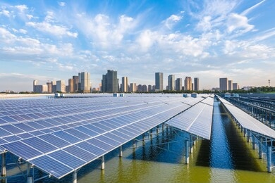 solar power station with city skyline