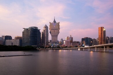 image of macau (macao), china. skyscraper hotel and casino building at downtown in macau (macao). asian tourism, modern city life, or business finance and economy concept