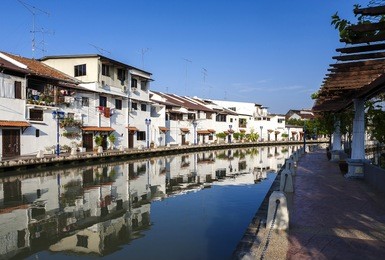 malacca city with house near river under blue sky in malaysia