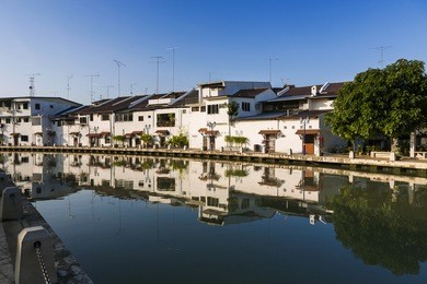 malacca city with house near river under blue sky in malaysia