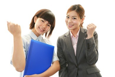 smiling teacher with student