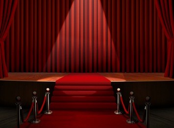 red carpet on stage with spotlight