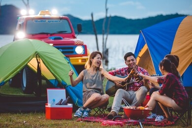 group of friends asian camp forest adventure travel remote relax concept, mountain view. dinner party, camping barbecue and drink beer camping tarvel hiking concept. 