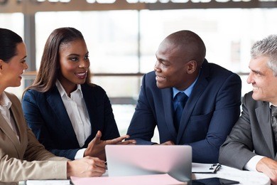 group of successful business people having meeting together