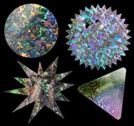 cool metallic holo stickers on black with scratches and cuts, sticky holographic iridescent color foil tapes or snips for your design poster.