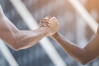 close up athlete men handshaking after match connect relationship, strength.