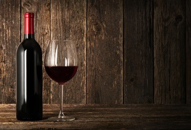 bottle of red wine and glass 