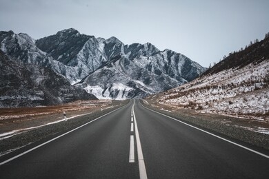 winter road in mountains. overcast.